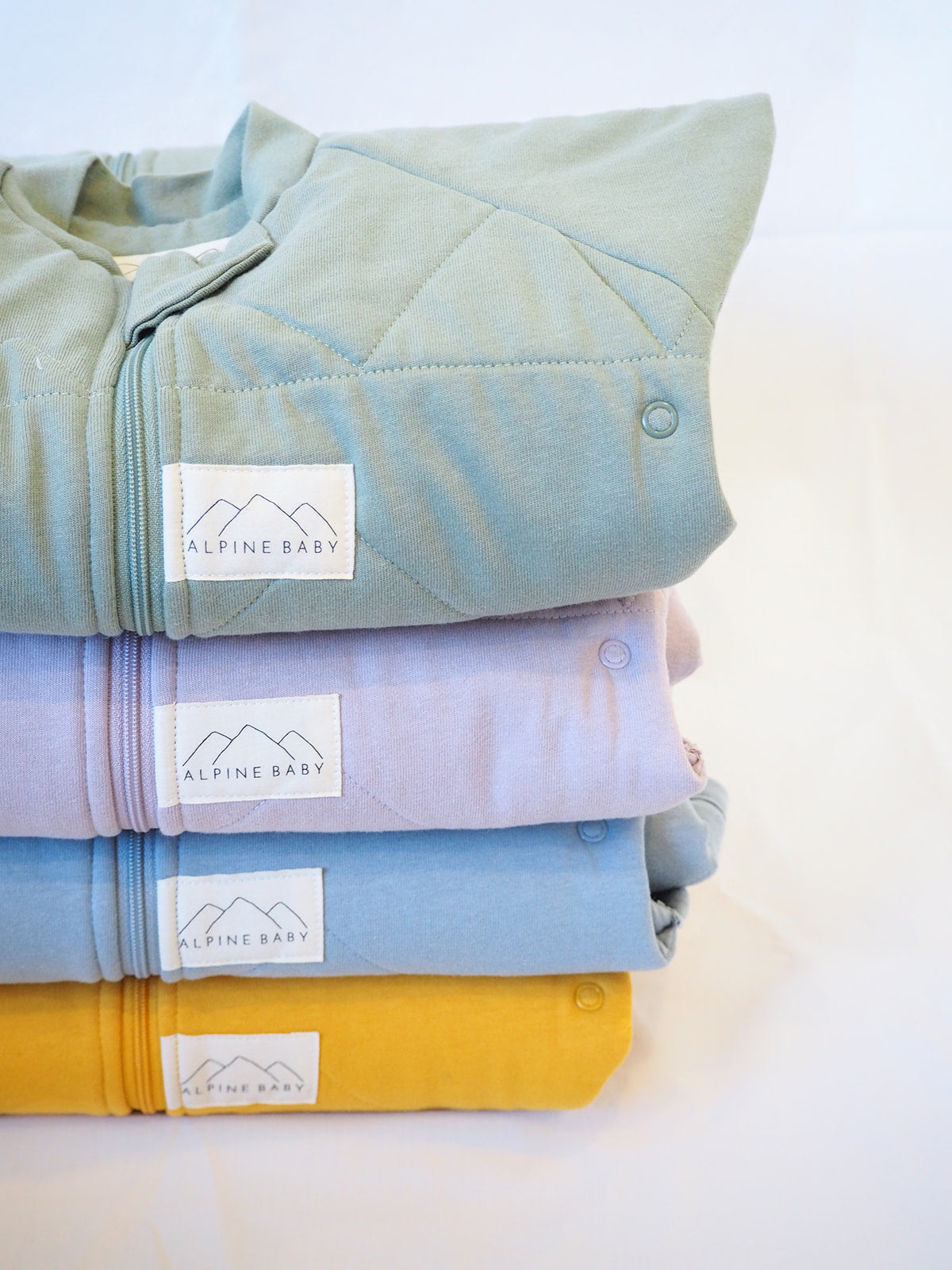 Alpine Baby Sleeping Bags - four colours in stack